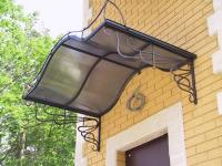 Кованый козырек для дачи